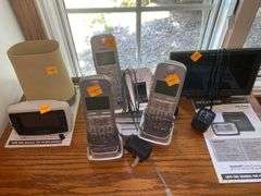 Assortment of Landline Phones and Monitors