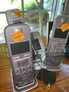 Assortment of Landline Phones and Monitors