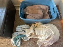 Storage bench and tote with curtains, sheets, and more