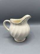 VARIETY OF PITCHERS, VASES, AND SUGAR BOWL