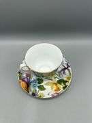 BAUM BROS 4 PC TEACUP AND SAUCER SET