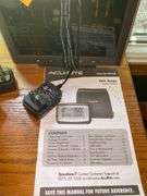Assortment of Landline Phones and Monitors