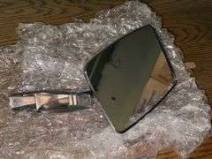 PAIR OF JUMPER CABLES, MOTOR OIL, AND GM SIDE MIRROR (SEE SERIAL CODE)