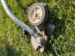 Stihl FC 75 Weedeater with Lawn Edger Attachment