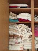 CONTENTS OF CABINET, TOWELS, WASHCLOTHS