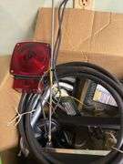ASSORTMENT BOX WITH TAIL/BRAKE LIGHT, WIRING, GLASS SQUEEGEES, CASTERS, RADIO ANTENNA AND MORE