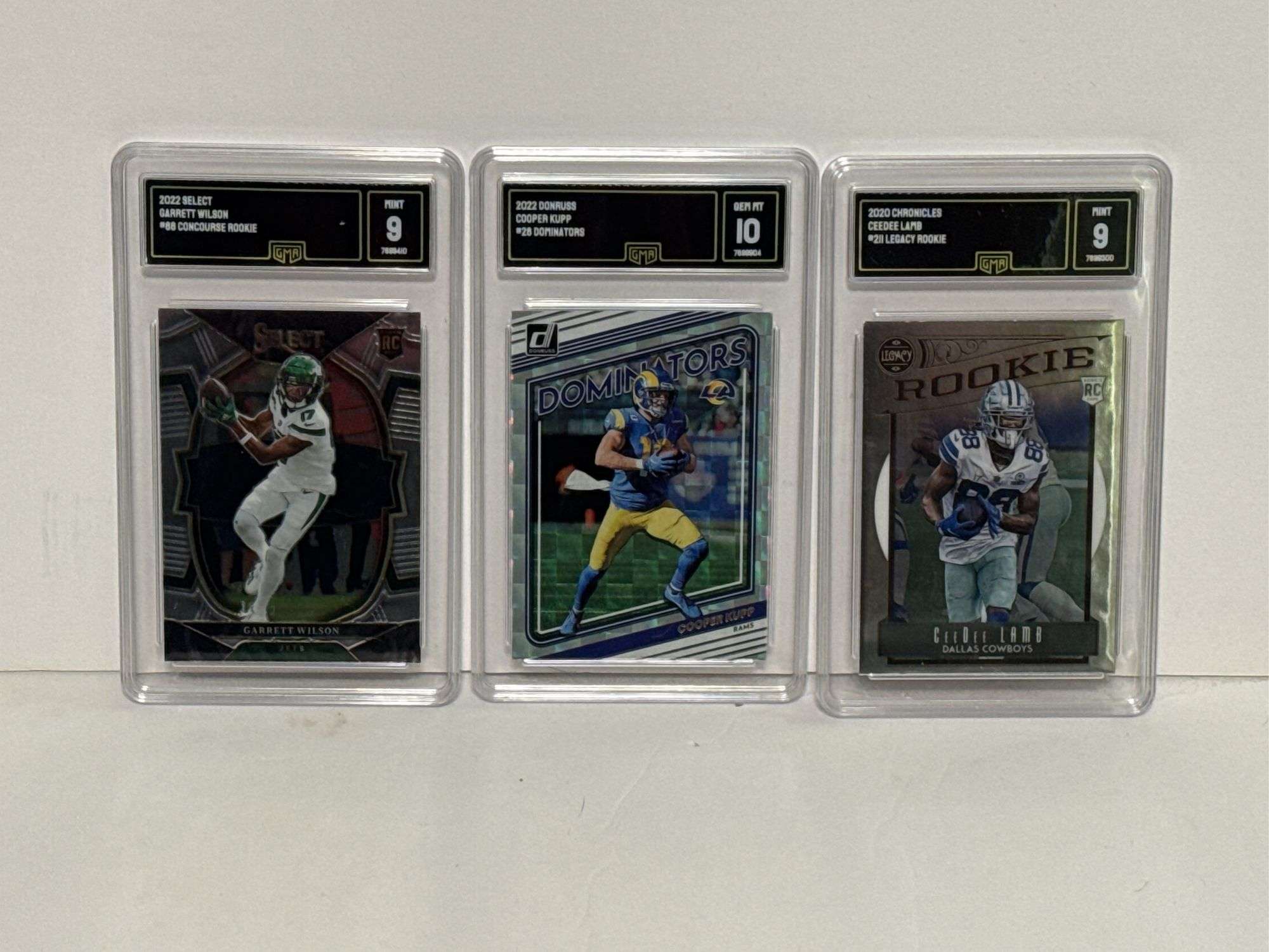 2022 Select Garrett Wilson Concourse Rookie (GMA 9), 2022 Donruss Cooper Kupp Dominators (GMA 10), a