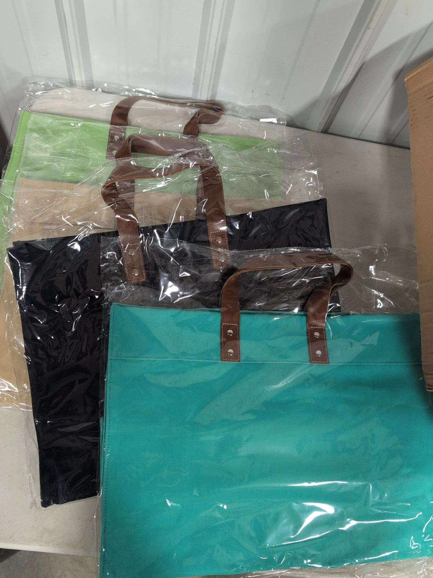 Box of brand new purses