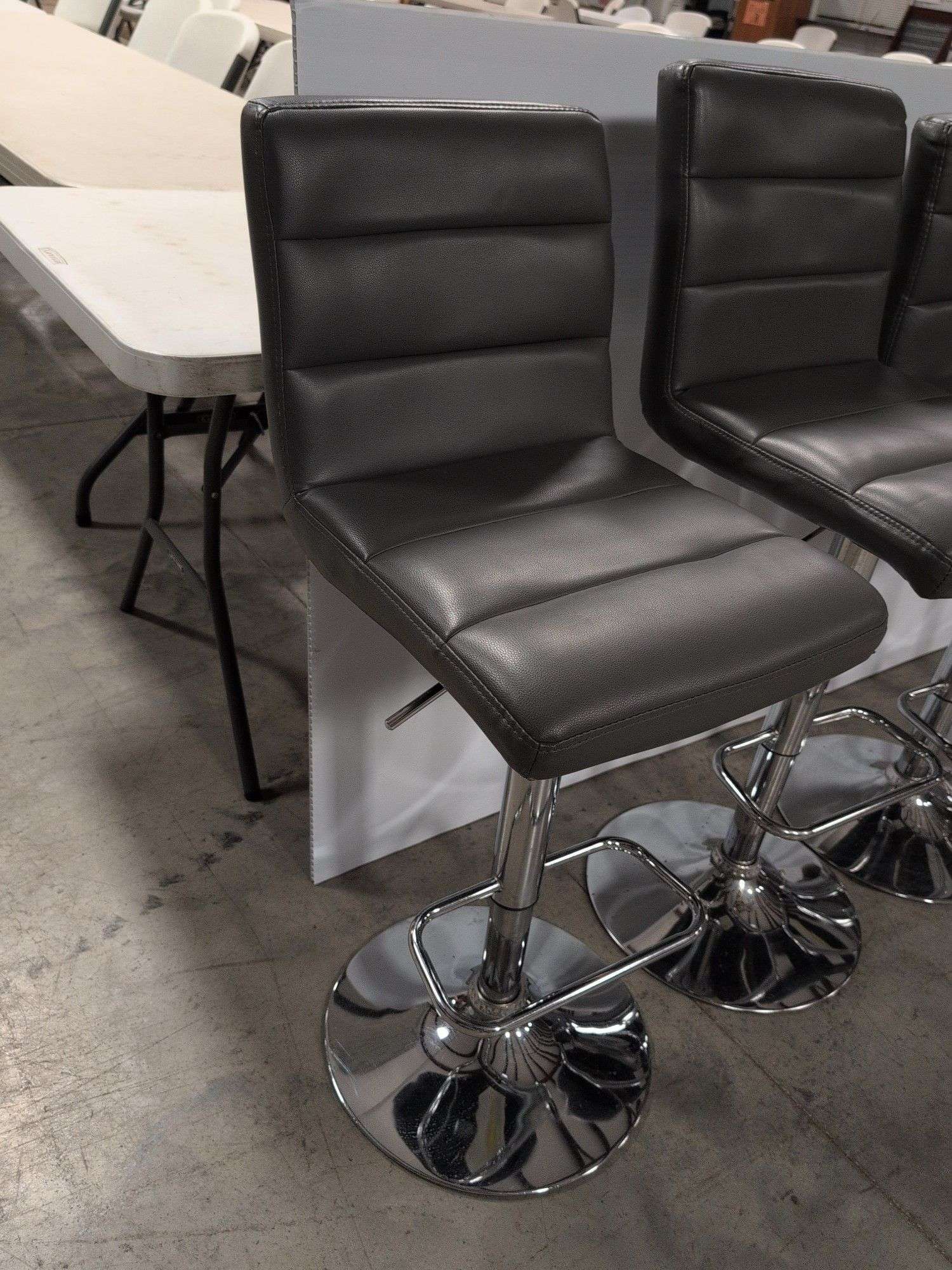 (4) matching grey leather swivel adjustable bar stools