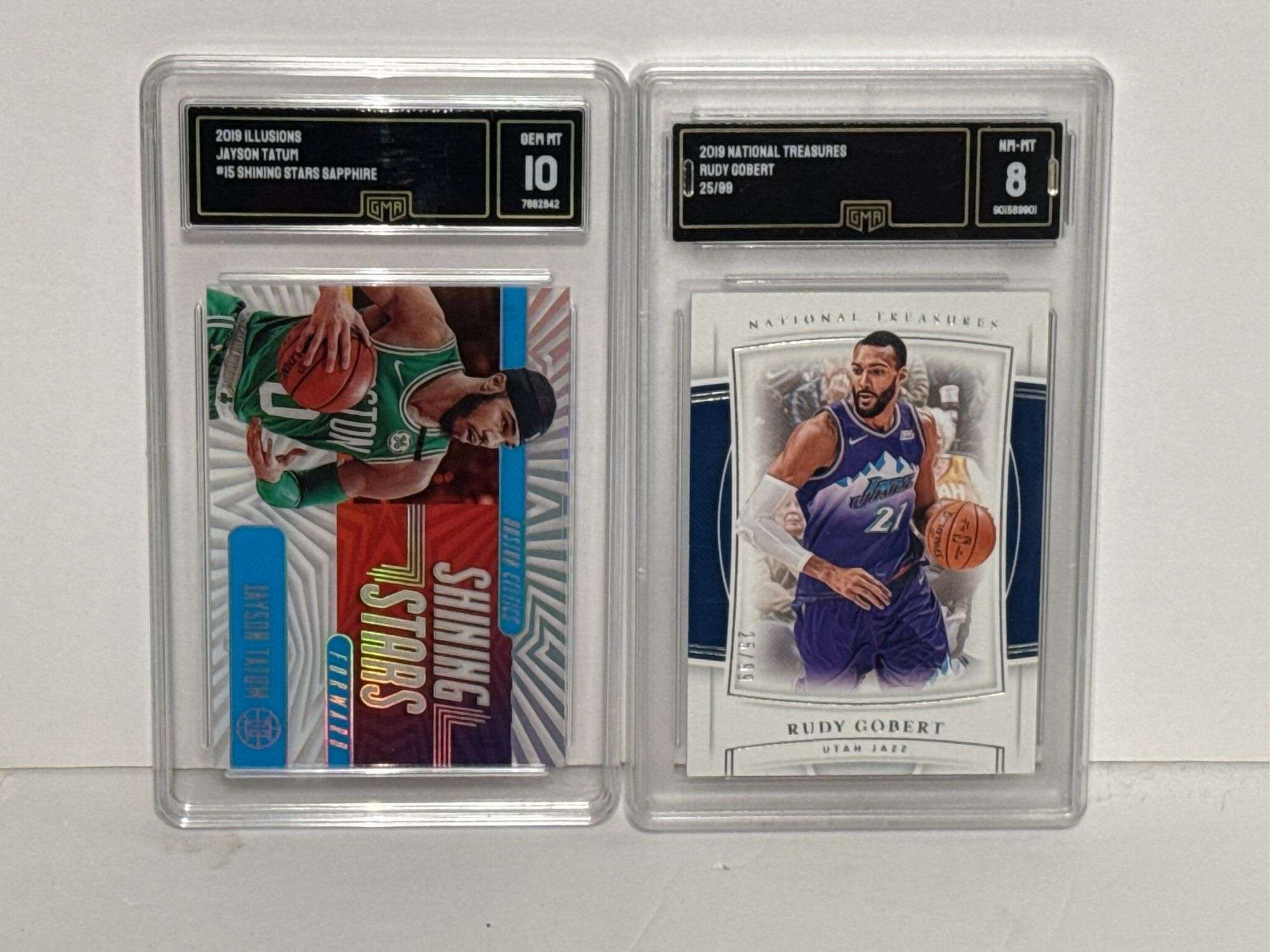 2019 Illusions Jayson Tatum Shining Stars Sapphire (GMA 10) and 2019 National Treasures Rudy Gobert 