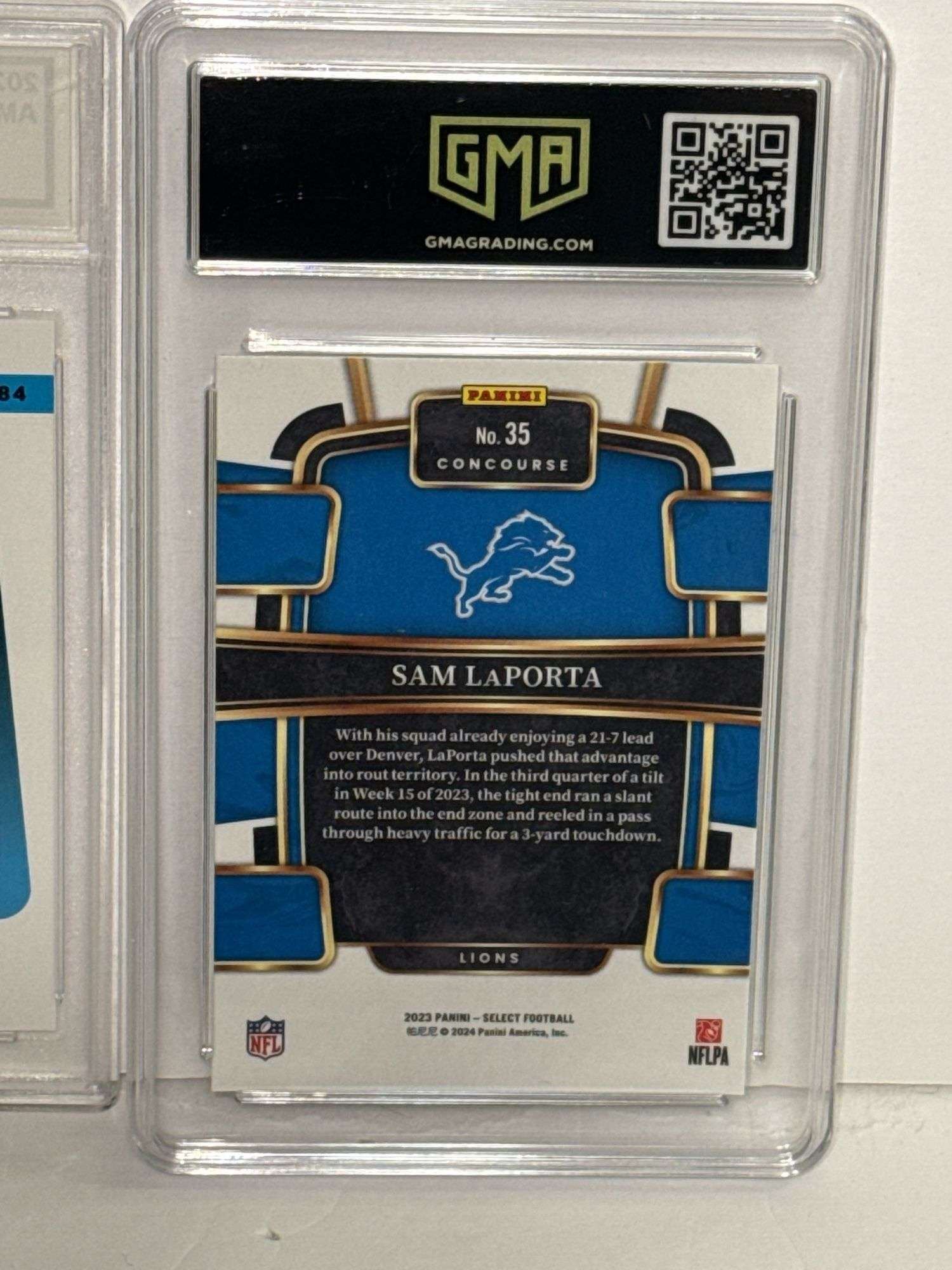 2021 Donruss Rated Rooke Amon-Ra St. Brown (SGC 10) and 2023 Select Sam LaPorta Concourse Rookie (GM