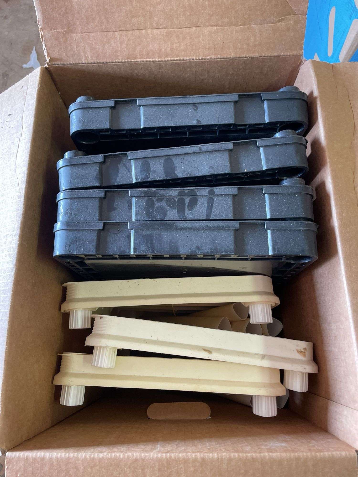 PAIR OF PLASTIC SHELVES