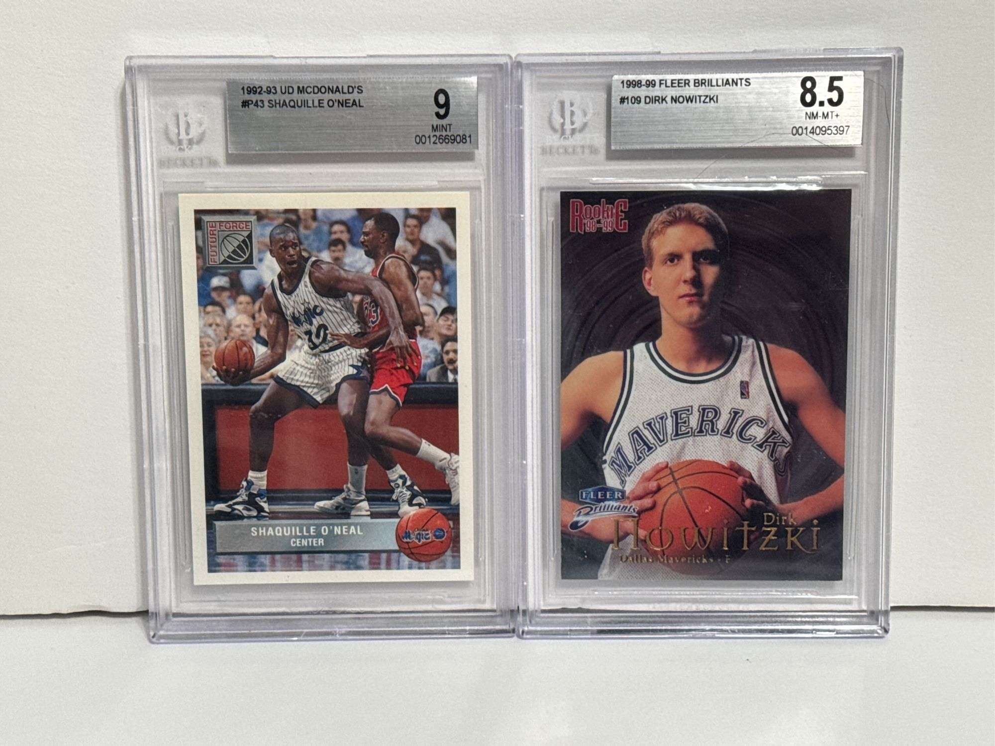 1992-93 UD McDonalds Shaquille O’Neal (BGS 9) and 1998-99 Fleer Brilliants Dirk Nowitzki RC (BGS 8.5