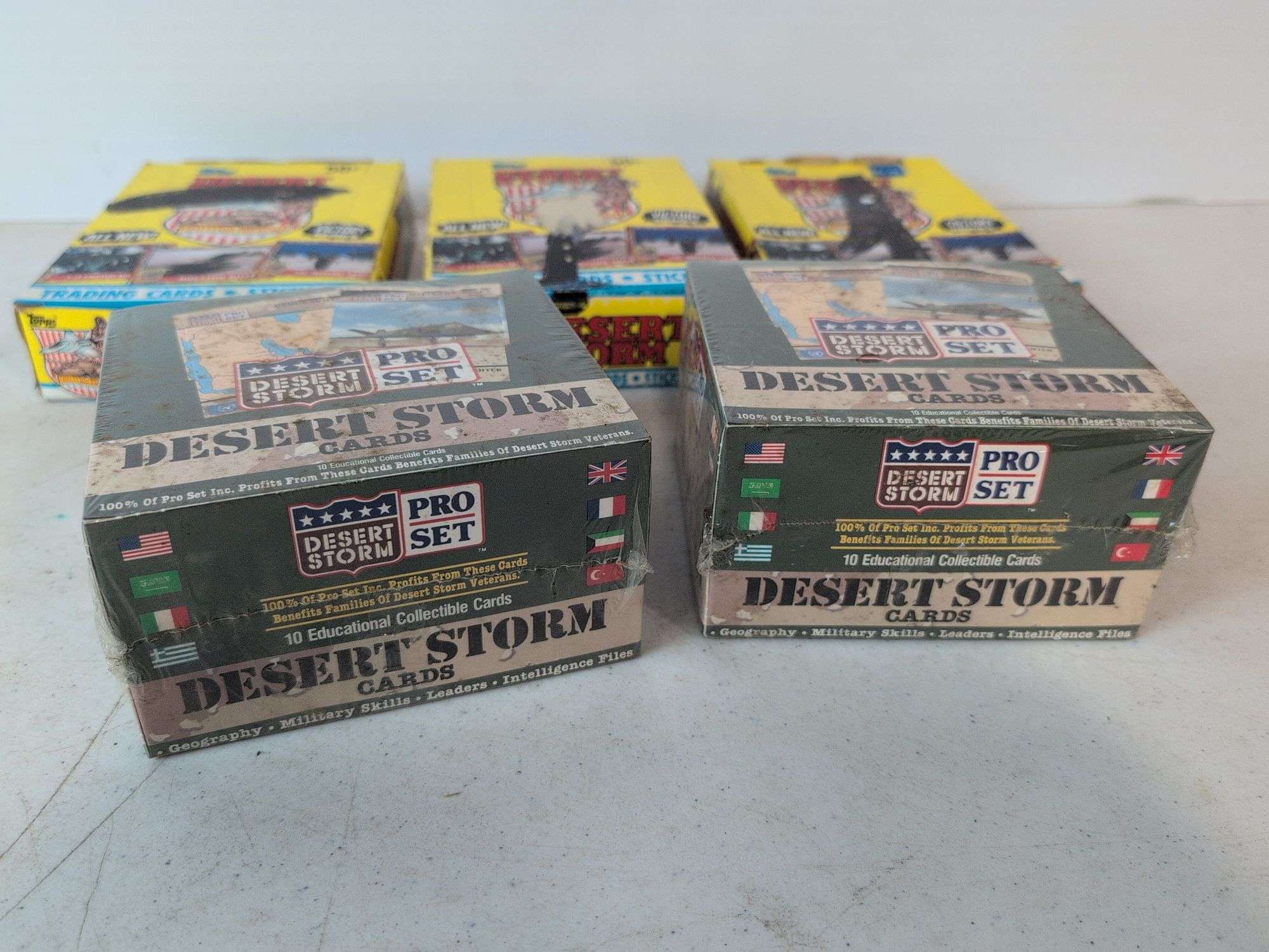 (5) Desert Storm trading card wax boxes- (2) factory sealed, and other Desert Storm cards and items