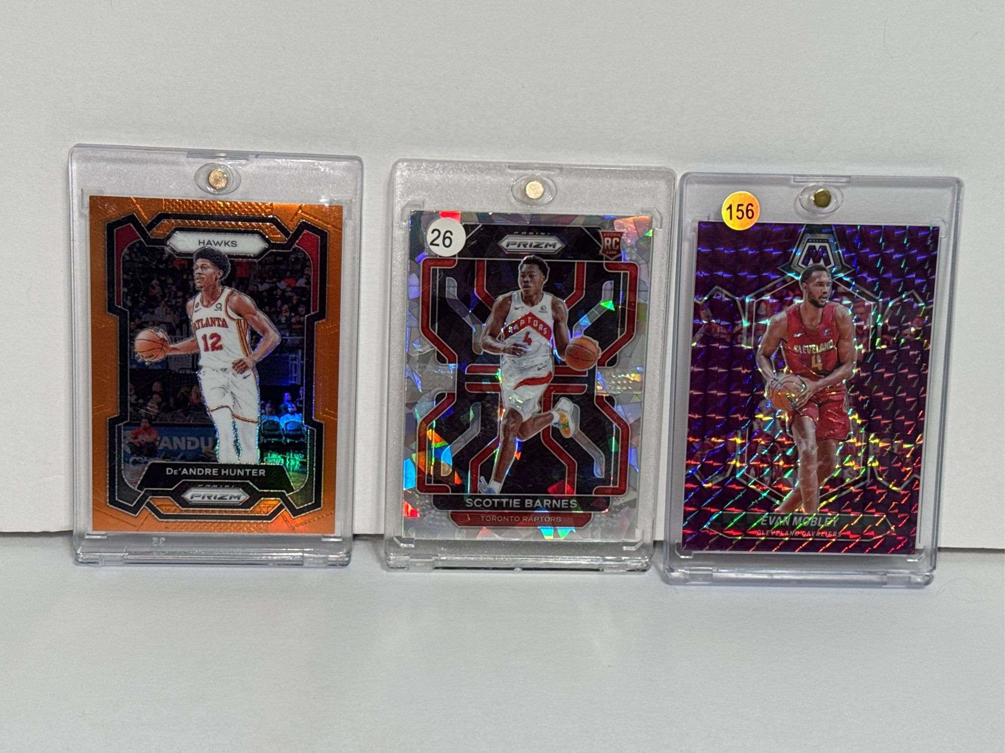 2021 Panini Prizm Scottie Barnes RC, 2023 Panini Prizm Orange Refractor De’Andre Hunter, and 2023 Pa