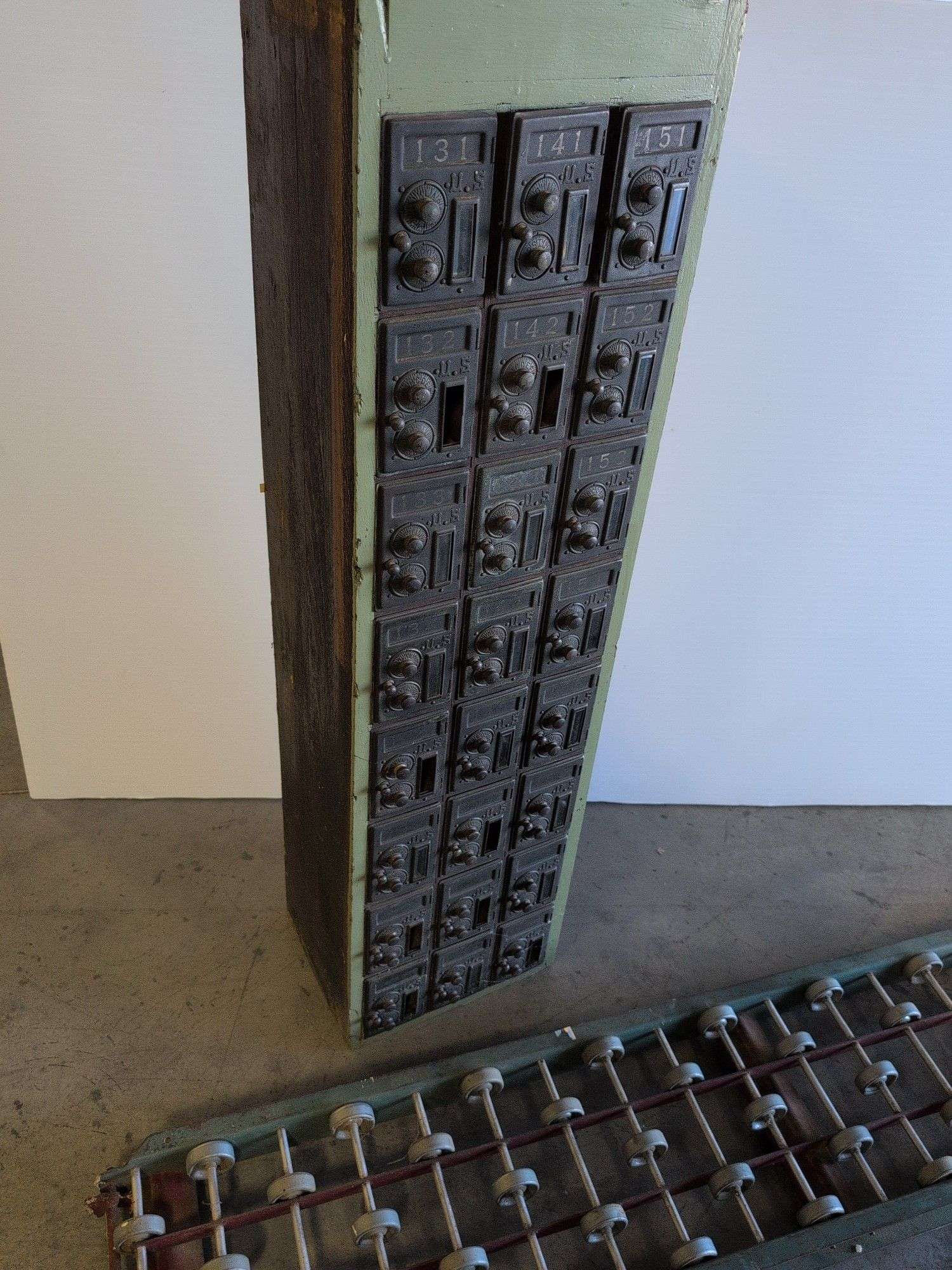 Vintage post office boxes and antique conveyor rollers