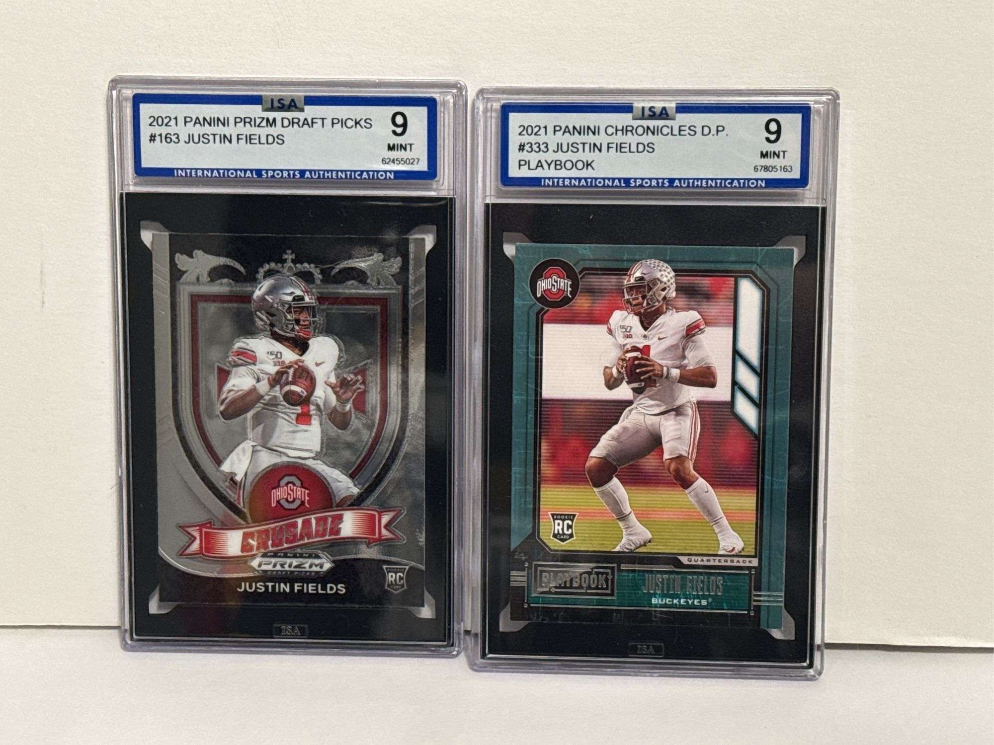 2021 Panini Chronicles D.P. Justin Fields Playbook RC (ISA Mint 9) and 2021 Panini Prizm Draft Picks