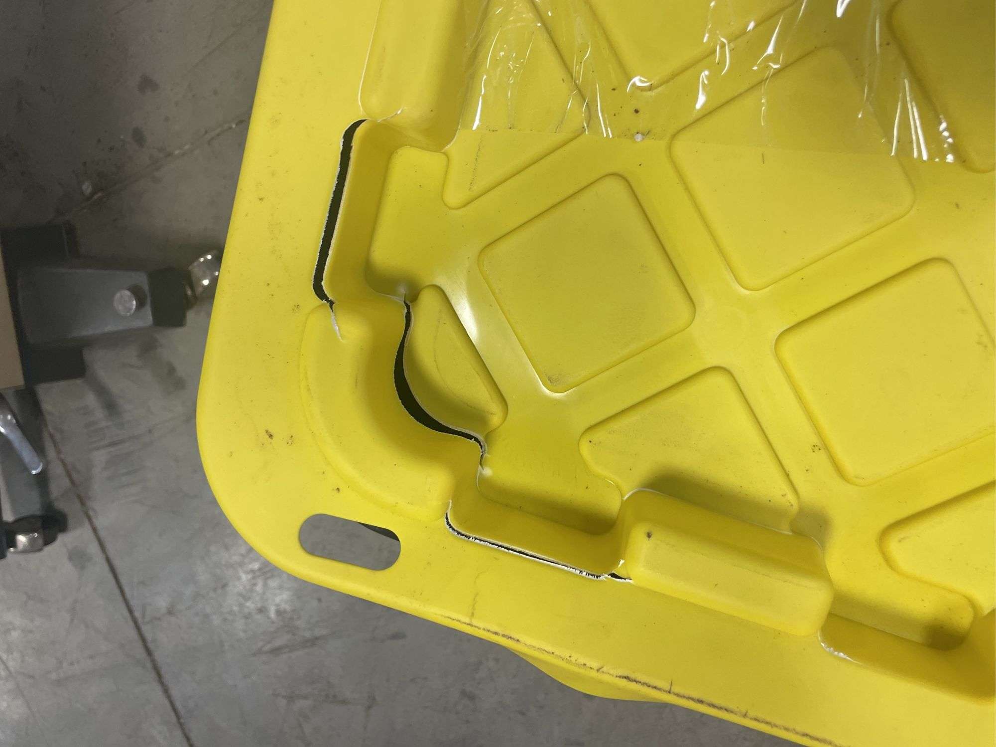 Tote of screws, woodworking supplies, and hardware