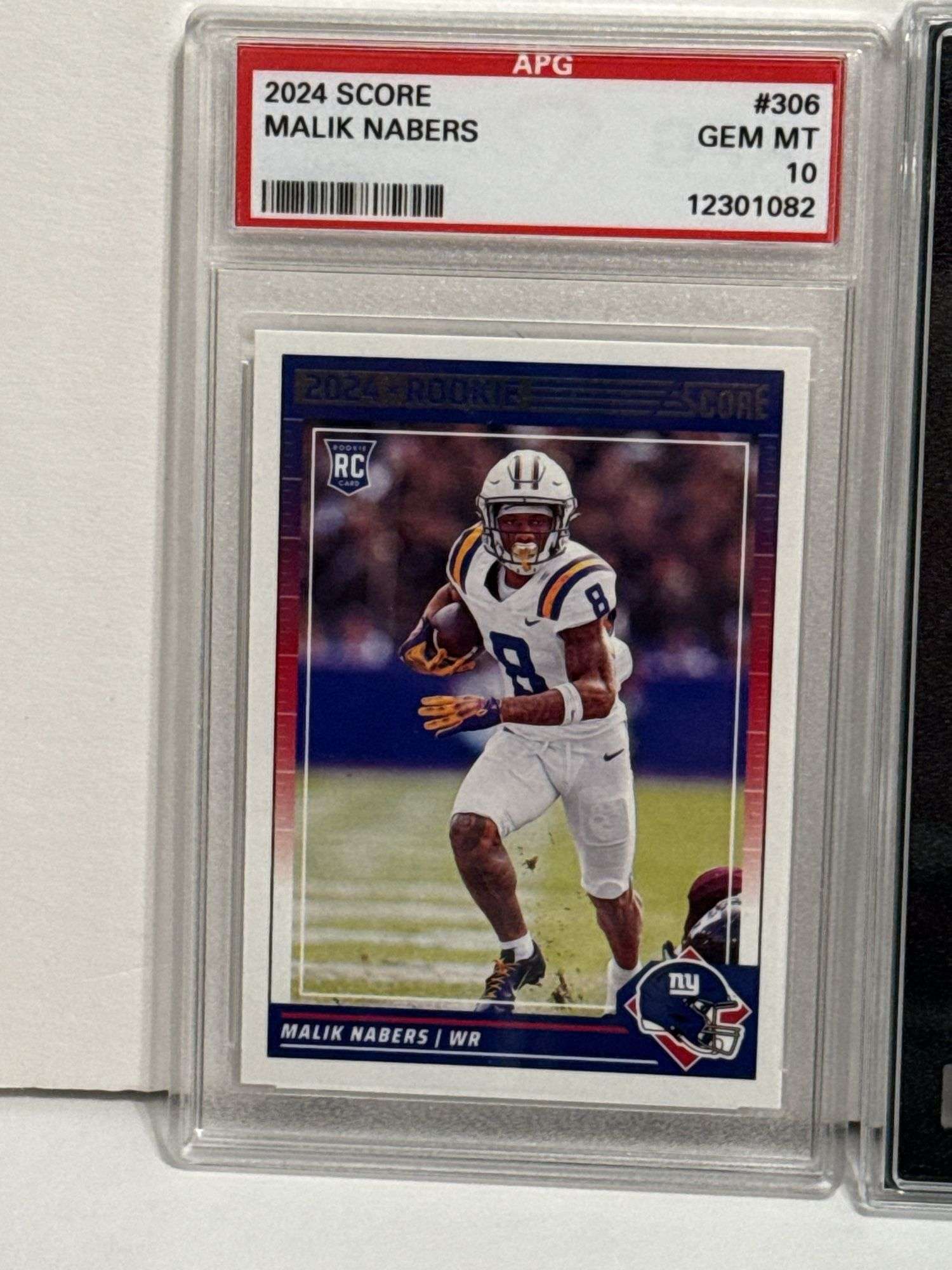 2024 Score Malik Nabers RC (APG Gem Mint 10) and 2023 Topps Composite CJ Stroud RC (SGC 9.5)