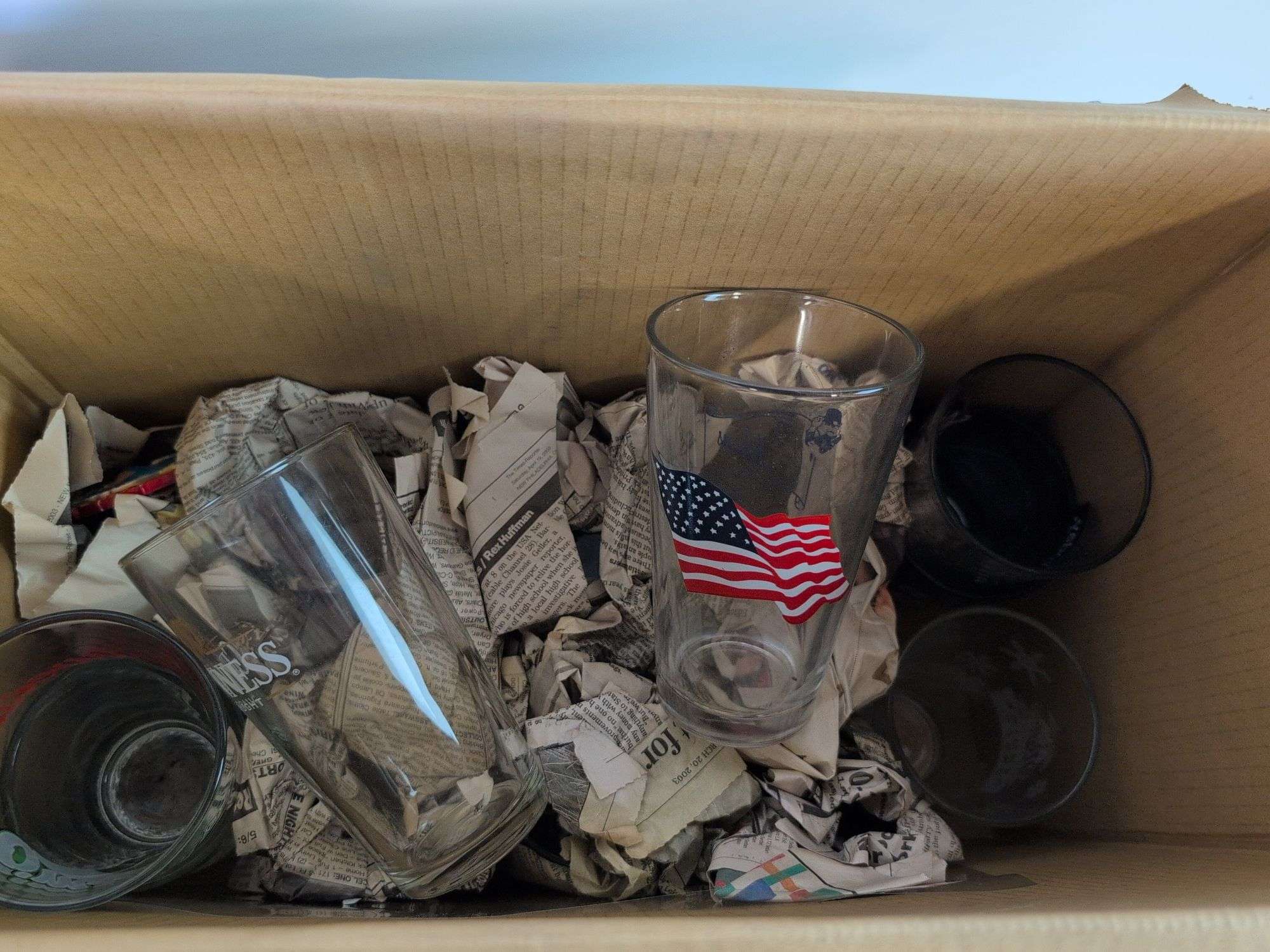 Drinking glasses, pitchers, and shot glasses with designs