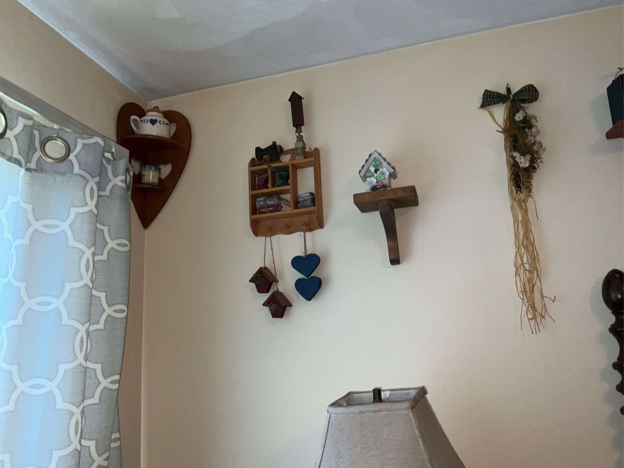 WOODEN SHELVES AND RUSTIC DECOR ON WALL