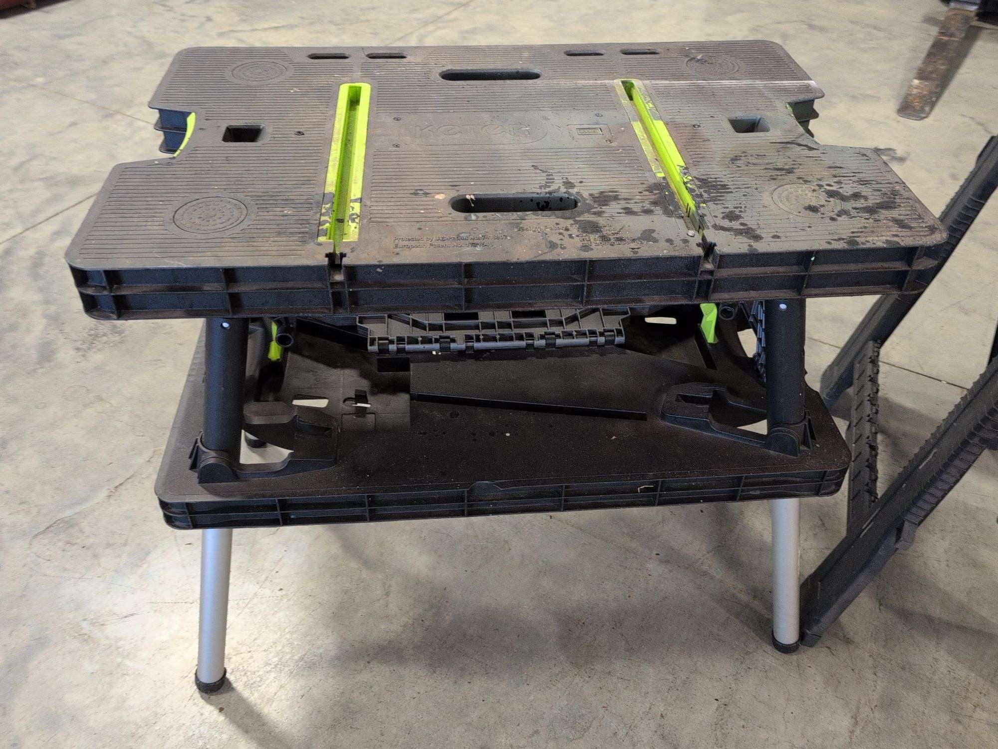 Keter collapsible work bench and (2) Task Force plastic saw horses