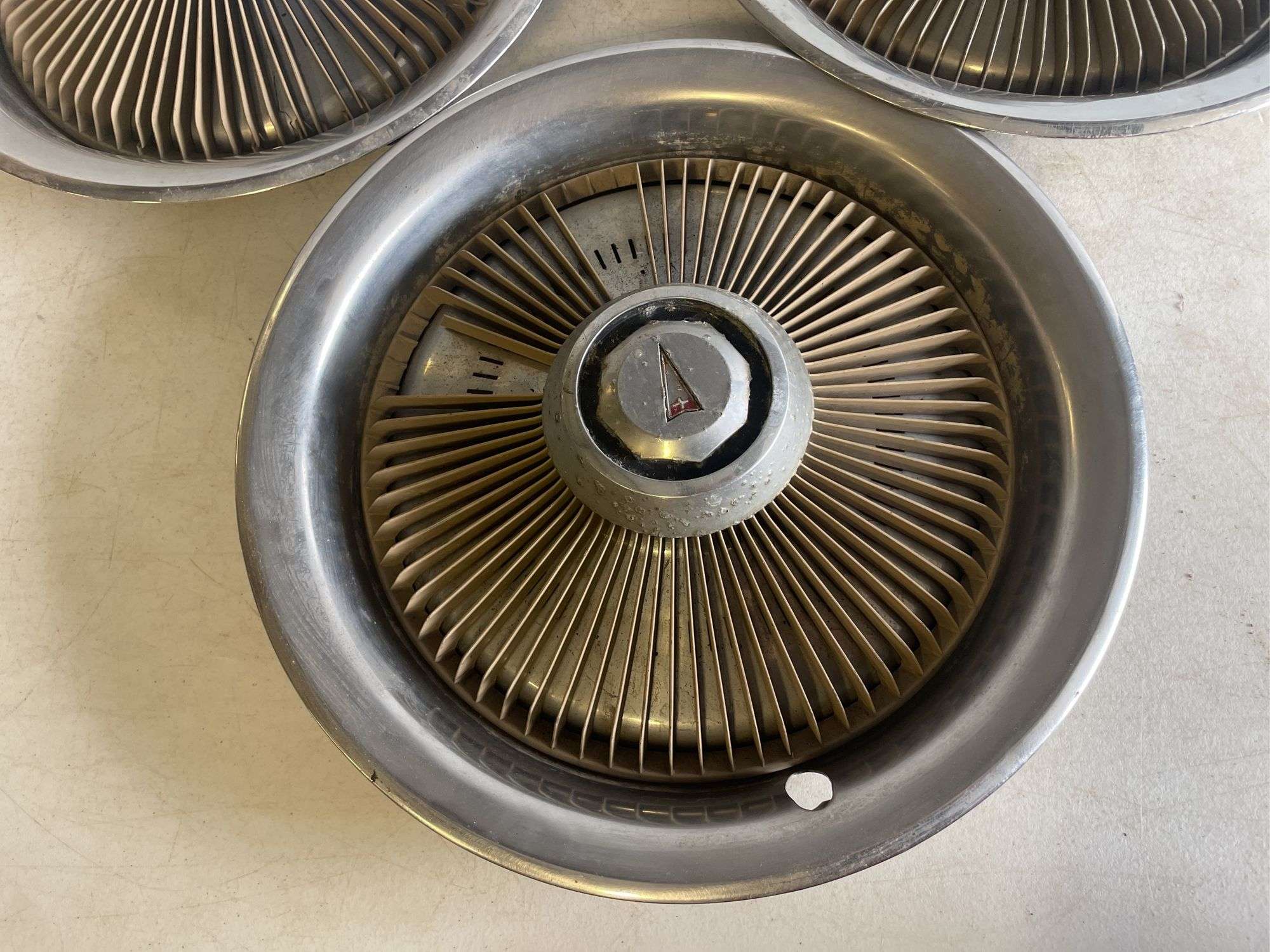 (3) Pontiac turbine style hubcaps