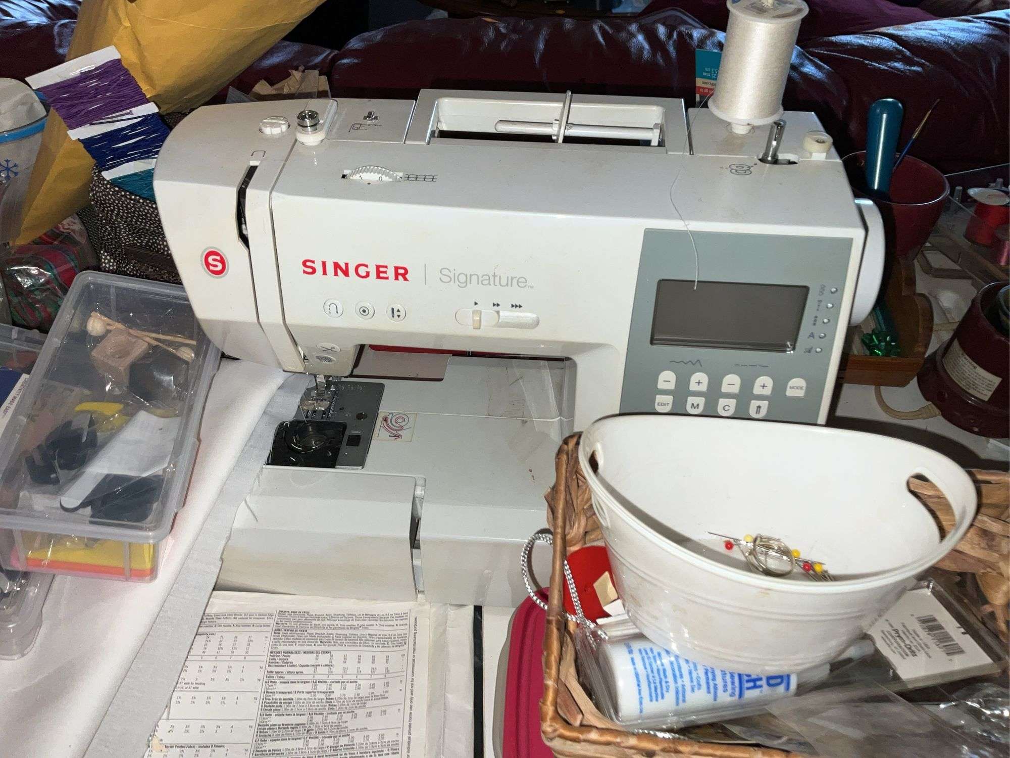 LARGE LOT OF SEWING SUPPLIES INCL. SINGER MACHINE, TABLE, OFFICE CHAIR
