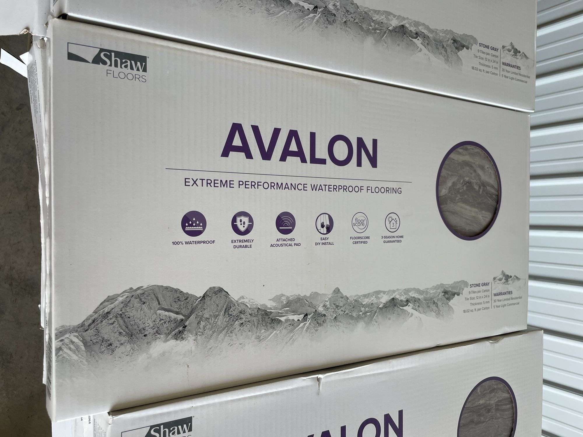 (16) boxes of Avalon extreme performance waterproof flooring - stone gray
