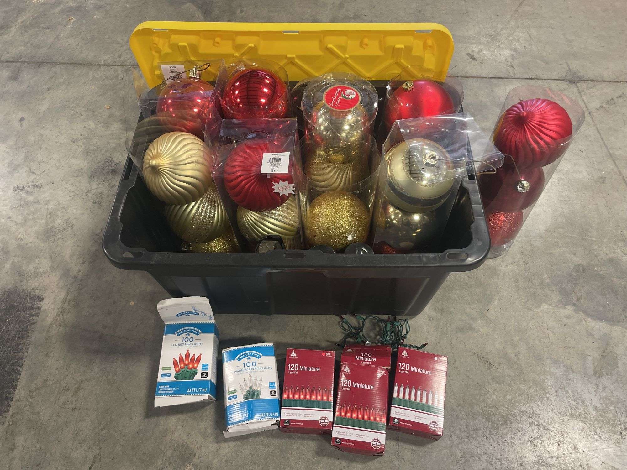 Tote of Christmas lights and decorative bulbs