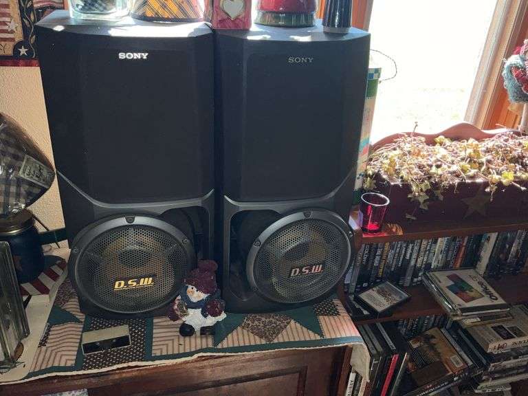 WOOD CABINET W/SPEAKERS AND SHELF OF DVD'S/CD'S