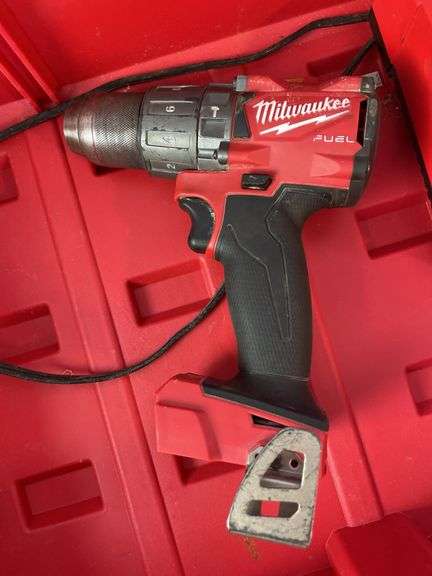 Milwaukee pack out and tool box with drill, impact, battery and charger