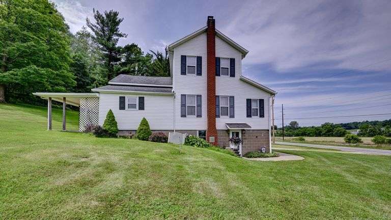 Absolute Home & Outbuildings on 3.75 Acres