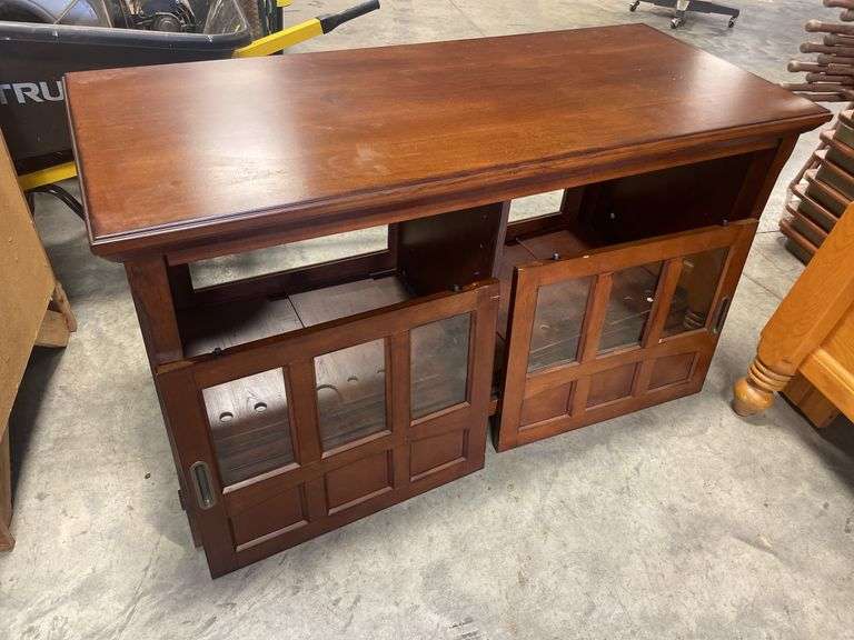 Wooden TV stand with glass doors