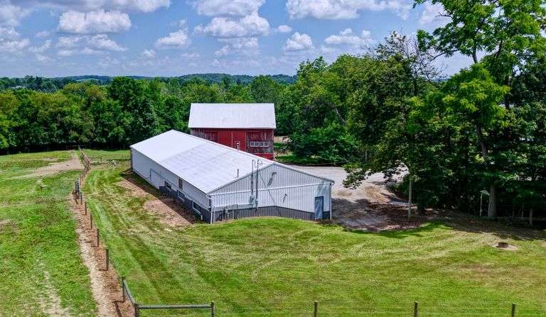 Parcel 1: 9.4 Acres with Farmstead, Pond and Cabin.