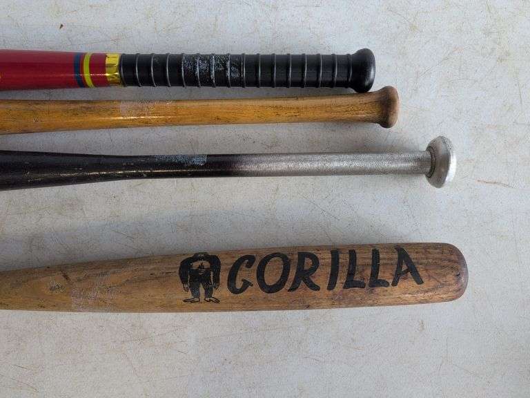 (2) wooden bats, metal bat, and plastic bat