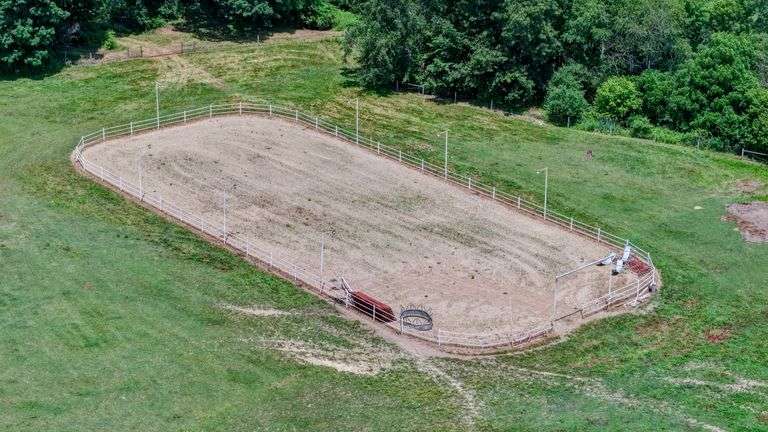 Parcel 2: 20.9 Acres with Riding Arena and Building Site.