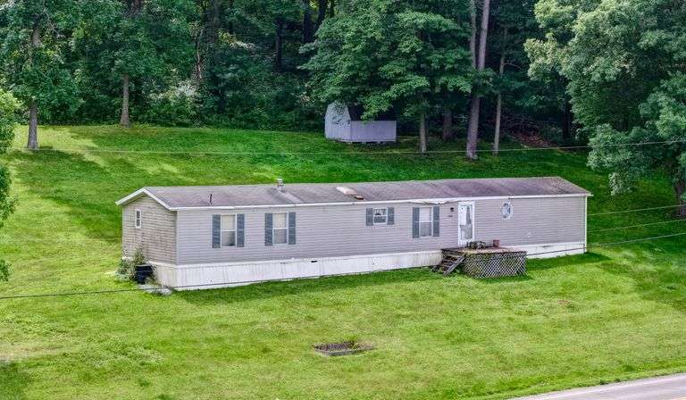 Absolute Home & Outbuildings on 3.75 Acres