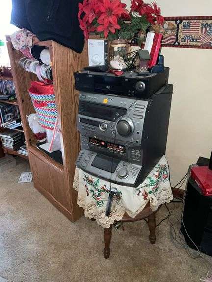 WOOD CABINET W/SPEAKERS AND SHELF OF DVD'S/CD'S