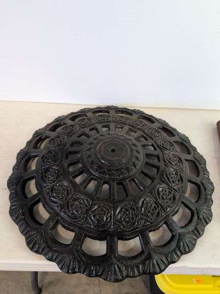 Large cast iron decorative piece and t-handled tool