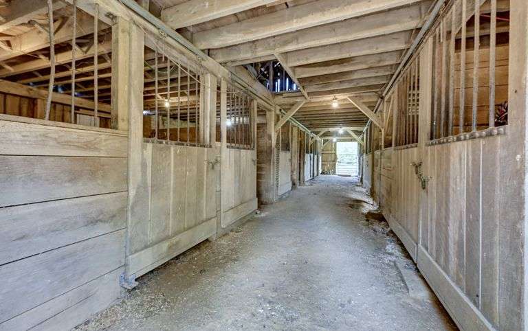 Parcel 1: 9.4 Acres with Farmstead, Pond and Cabin.