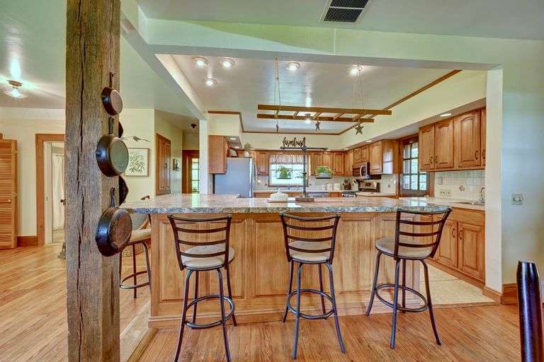 Parcel 1: 9.4 Acres with Farmstead, Pond and Cabin.