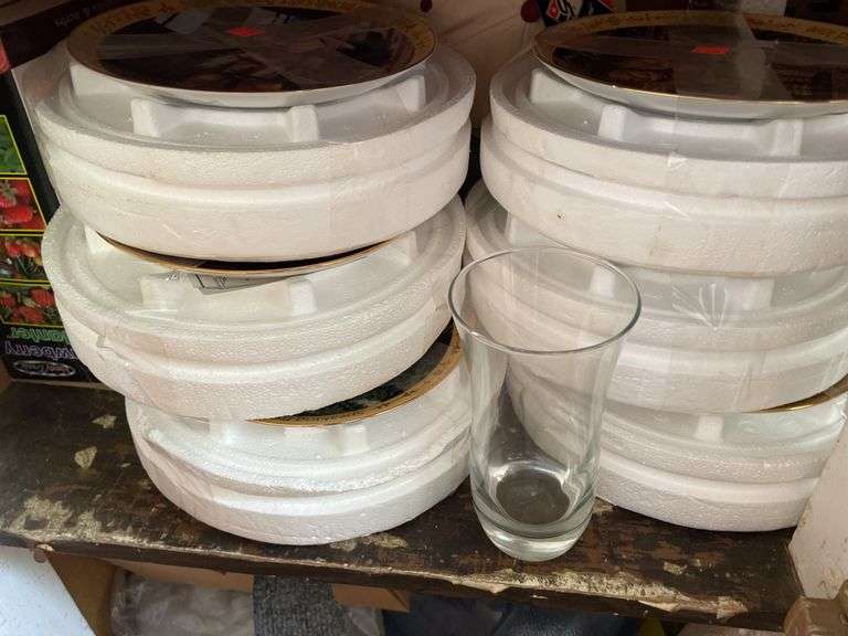 CONTENTS INCLUDING HUMMEL DECOR PLATES, VINTAGE WATERING CANS AND MORE
