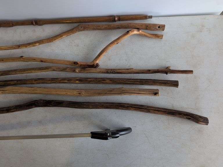(7) unique walking sticks and grabber