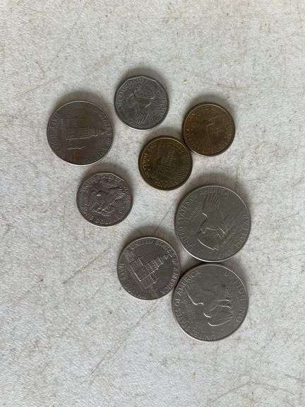 (2) Eisenhower dollar coins, (2) Kennedy half dollars, (2) Susan B. Anthony dollar coins, and (2) Sa