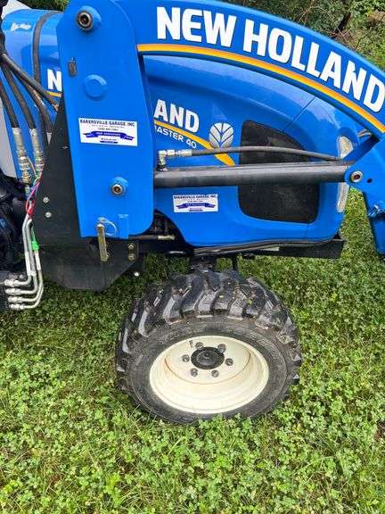 New Holland Workmaster 40 Tractor , 4WD with front end loader, Pto , 3 pt. , (Only 276 Hours )