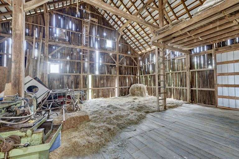 Parcel 1: 9.4 Acres with Farmstead, Pond and Cabin.