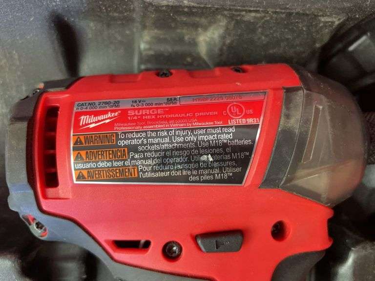 Milwaukee pack out and tool box with drill, impact, battery and charger