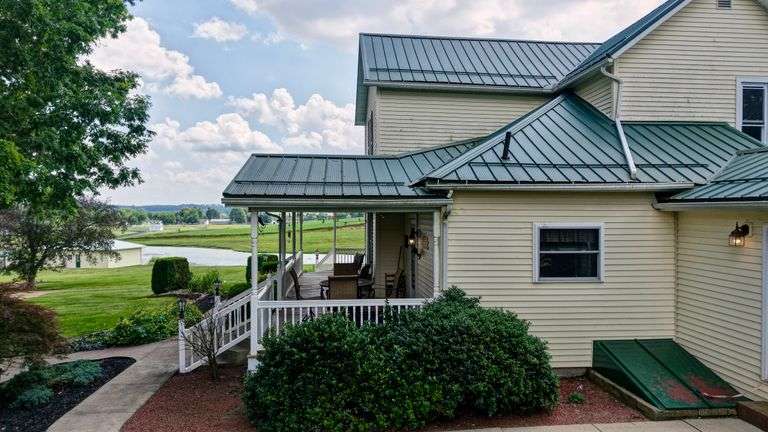 Parcel 1: 9.4 Acres with Farmstead, Pond and Cabin.