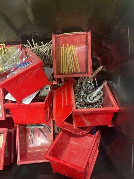 Tote of screws, woodworking supplies, and hardware
